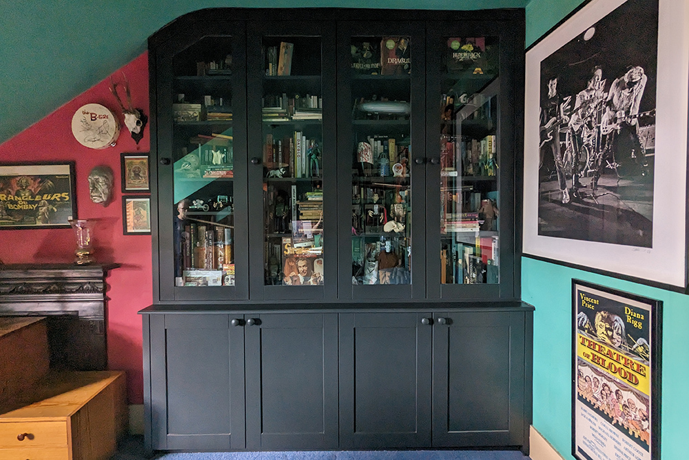 Bespoke slanted cabinet in loft room