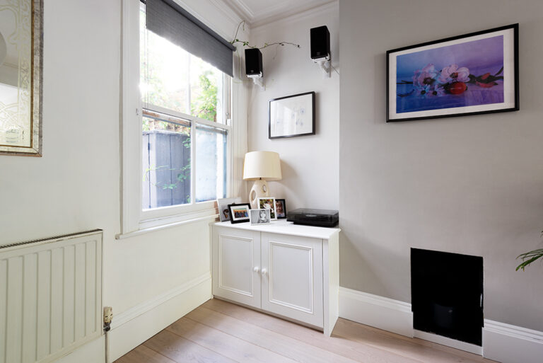 Built in alcove cupboard in the corner of the living room