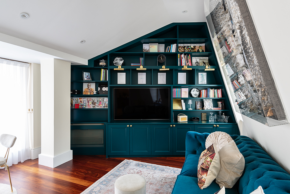 Built-in cupboard on slanted ceiling