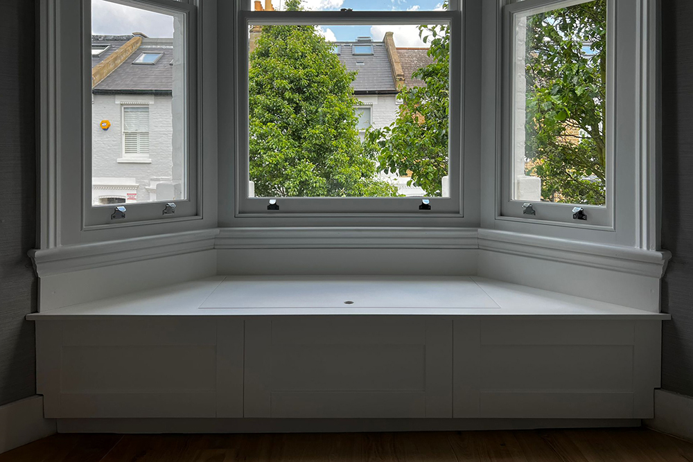 Built in white window bench