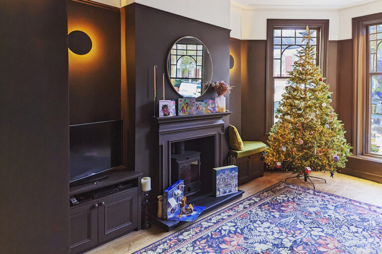 Fitted brown alcove cupboard in living room