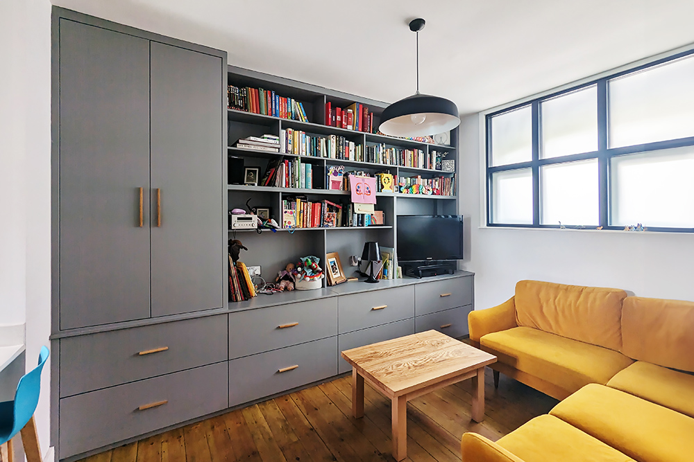 Grey fitted media unit in living room