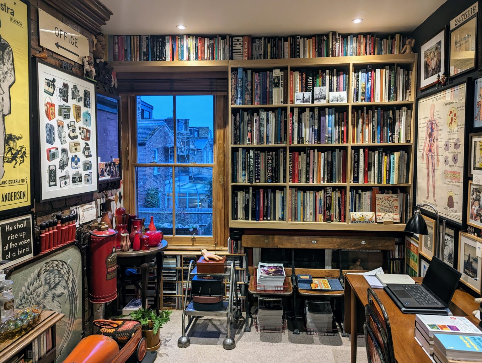 After picture of a built-in shelving unit to store lots of books