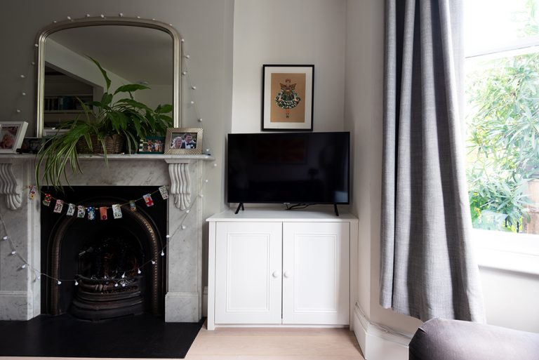 2 built in alcove cupboards in living room. Made with MDF and hand-painted.