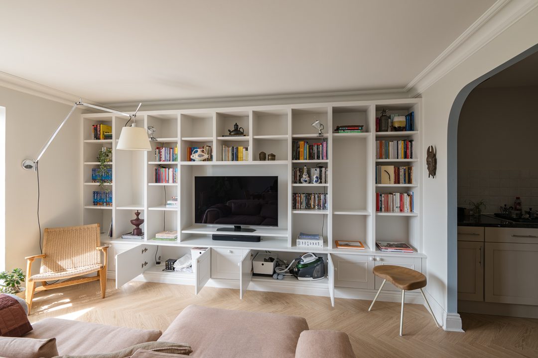 Built in TV unit with cupboard doors open