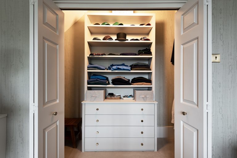 Bespoke wardrobe in walk in closet