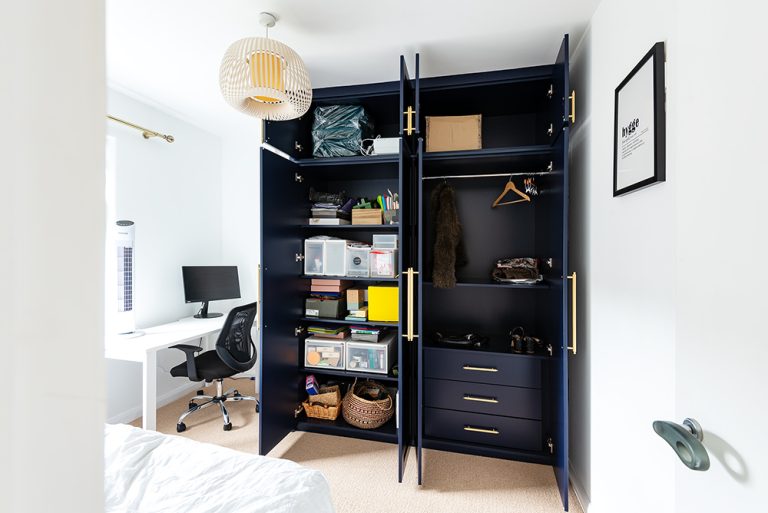 Bespoke blue wardrobe in spare room