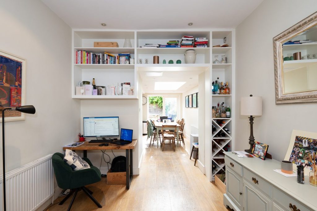 Built-in shelving unit over the door