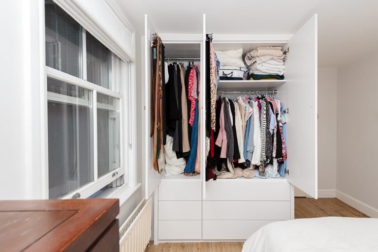 Inside view of a bespoke modern 3 door wardrobe