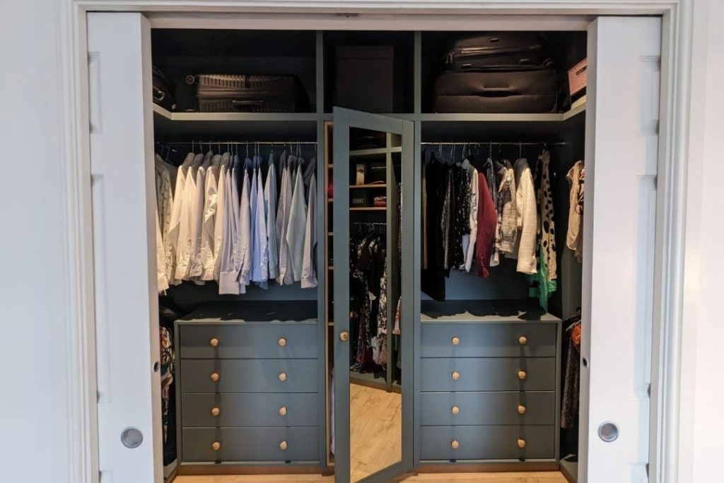 Bespoke walk in blue wardrobe, made with MDF and hand-painted.