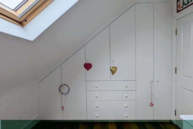 6 door loft wardrobe in kid's bedroom.