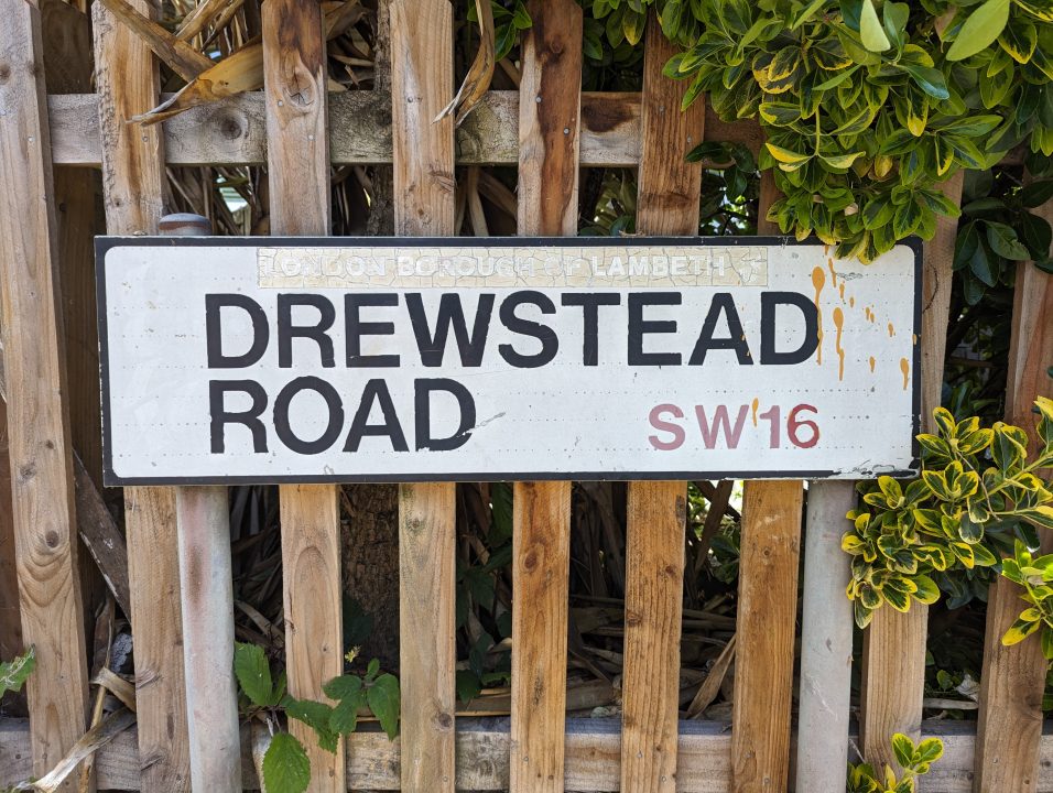 A street sign on a fence in Streatham