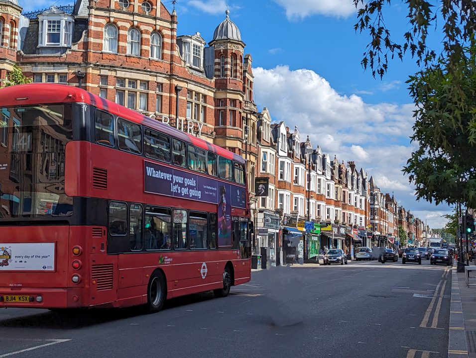 Town centre of Haringey with red bus going through