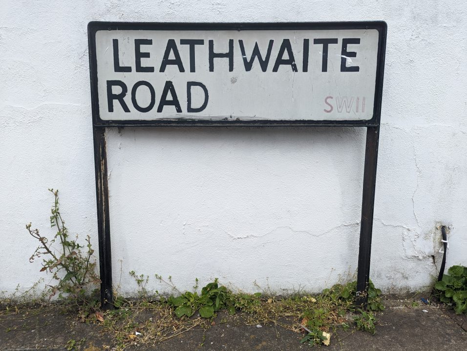 A white road sign near Clapham Junction