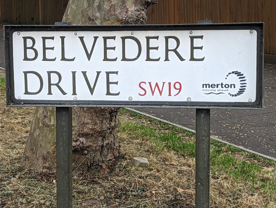 A road sign called Belvedere Drive in Wimbledon