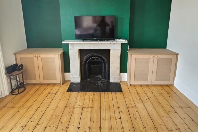 Two alcove cupboards next chimney