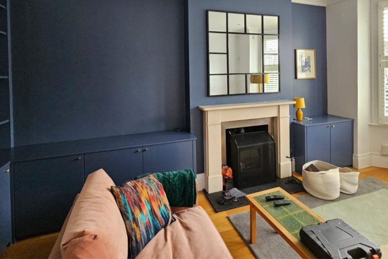 Blue painted alcove cupboards