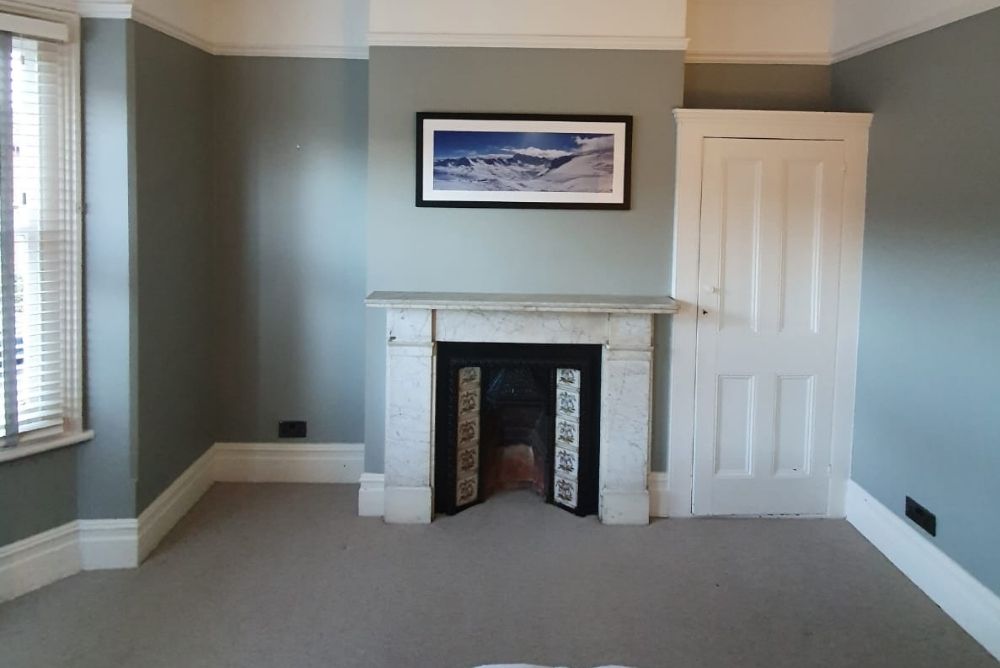 Empty space in alcove next to chimney