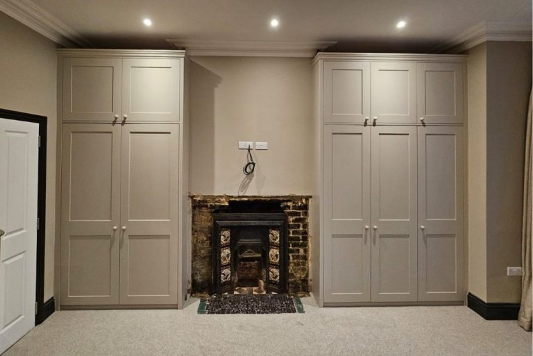 Grey painted alcove wardrobes