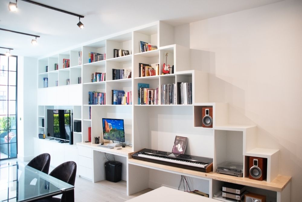 Large white media unit and shelving