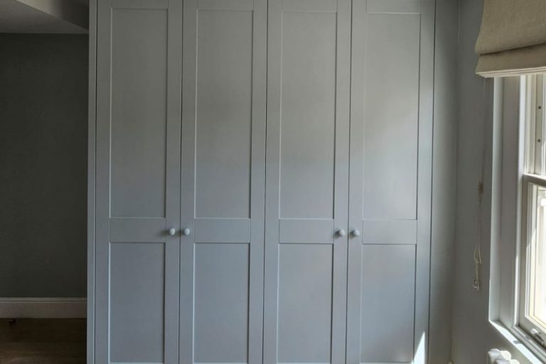 Blue fitted shaker style wardrobe