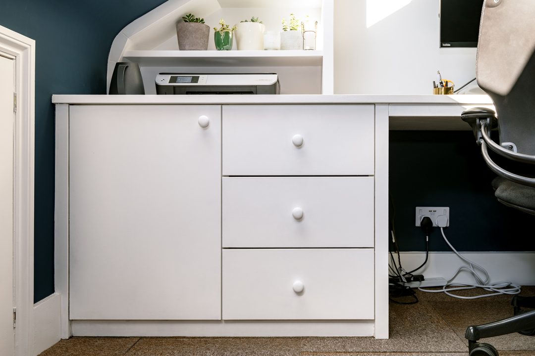 Built in white home office cupboards