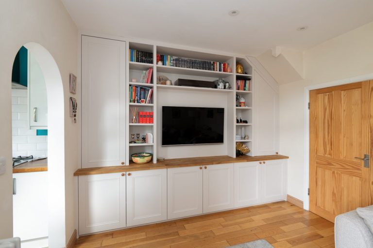 White wall to wall media unit