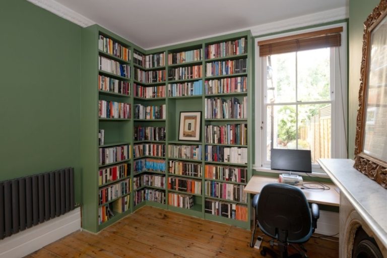 Corner green built in bookshelf