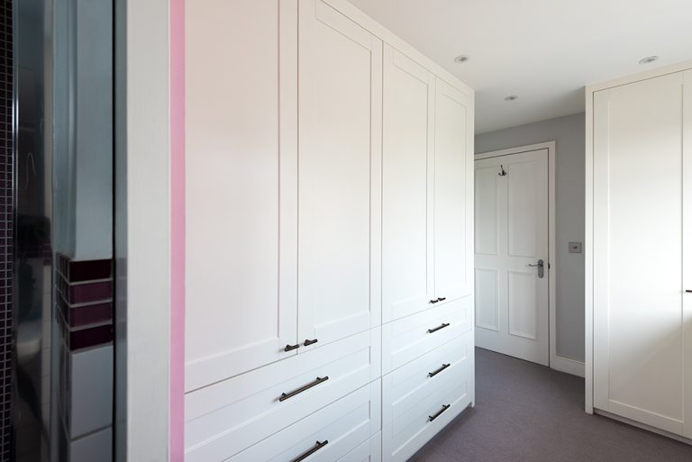 White fitted wardrobe with drawers