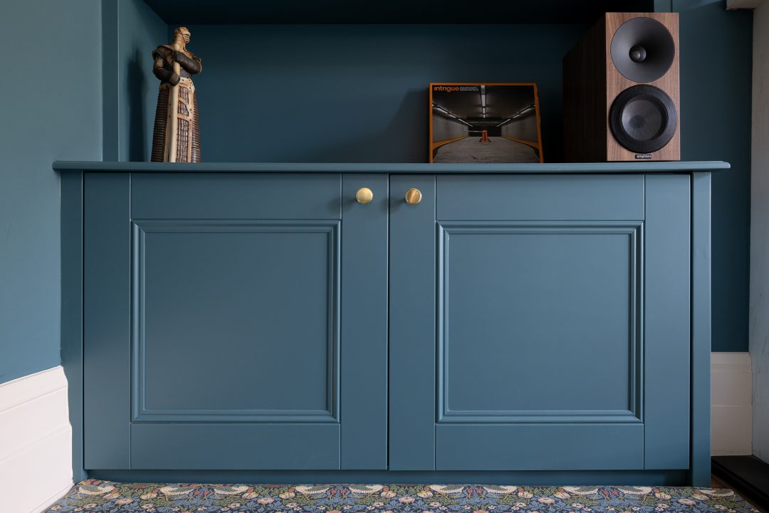 Alcove cupboard with shaker style beading painted in blue