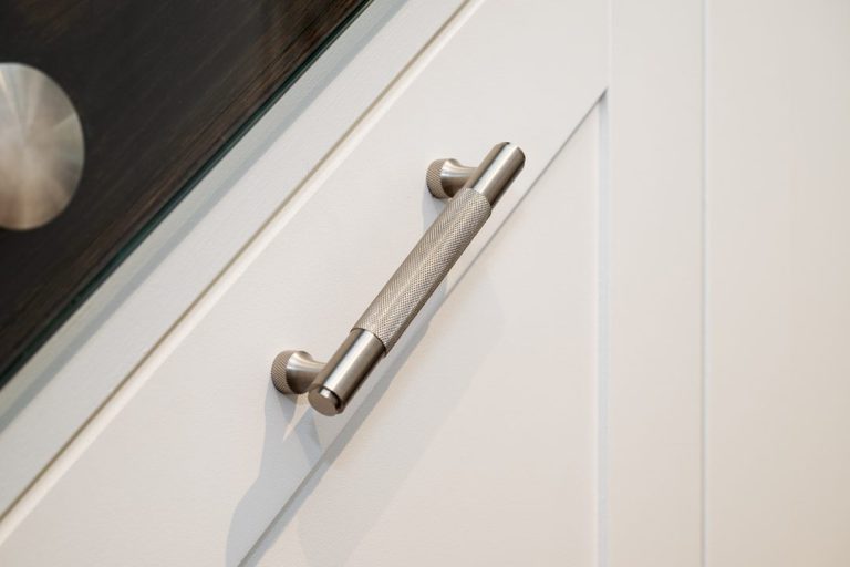 Under stairs cupboards in shaker style with door handle