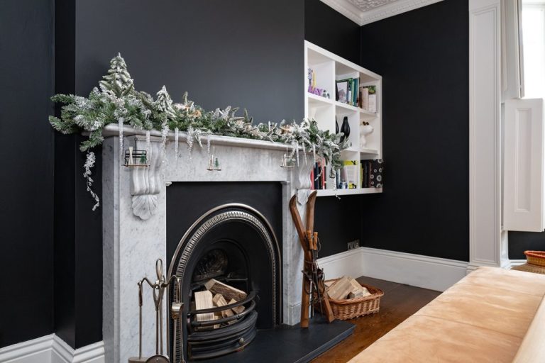 Built in alcove shelving with Christmas decorations