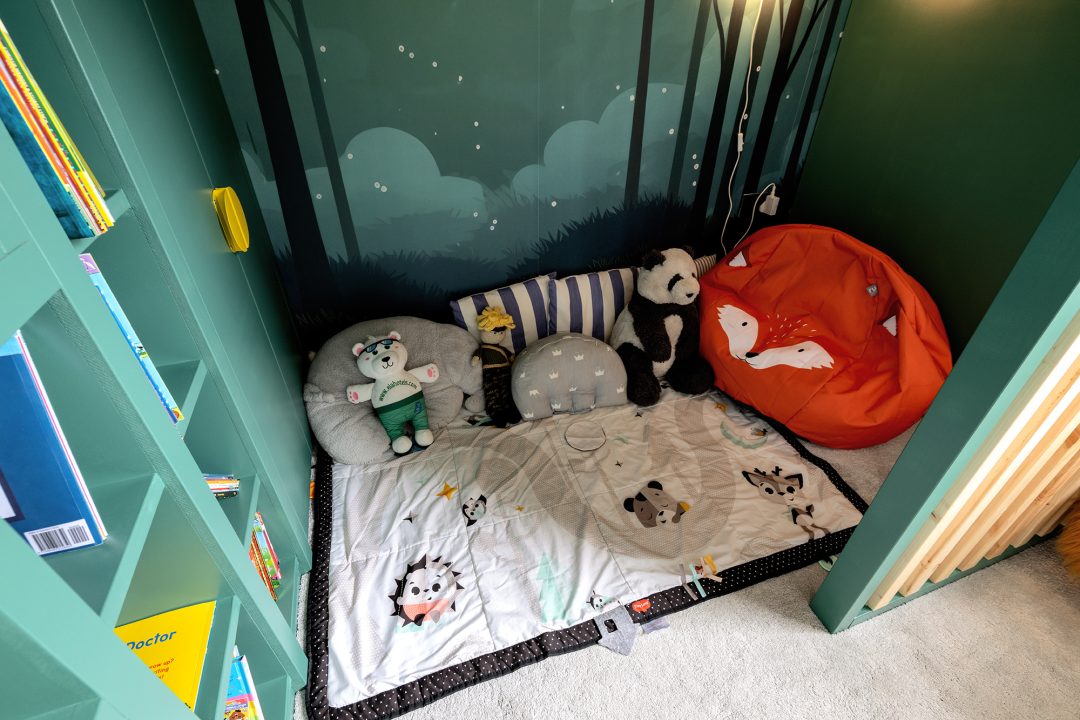 Kid's cabin bed with play area