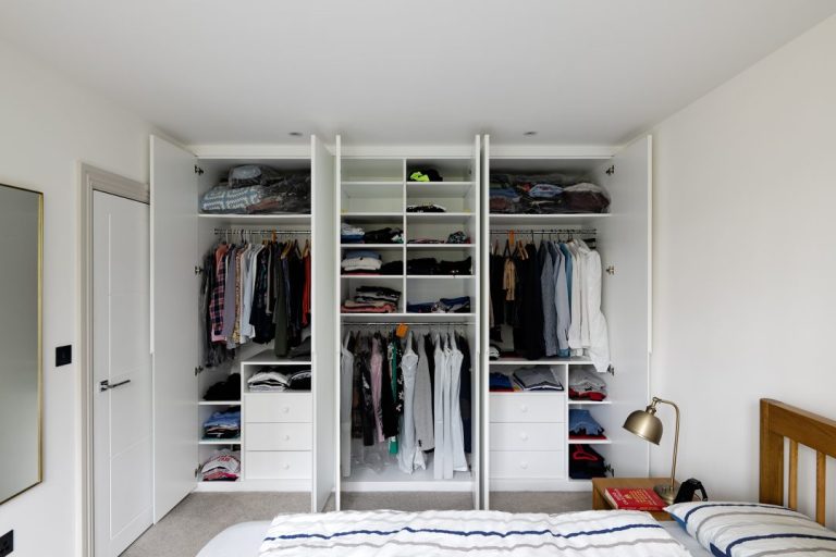 rails, drawers, shelves inside a 6 door wardrobe