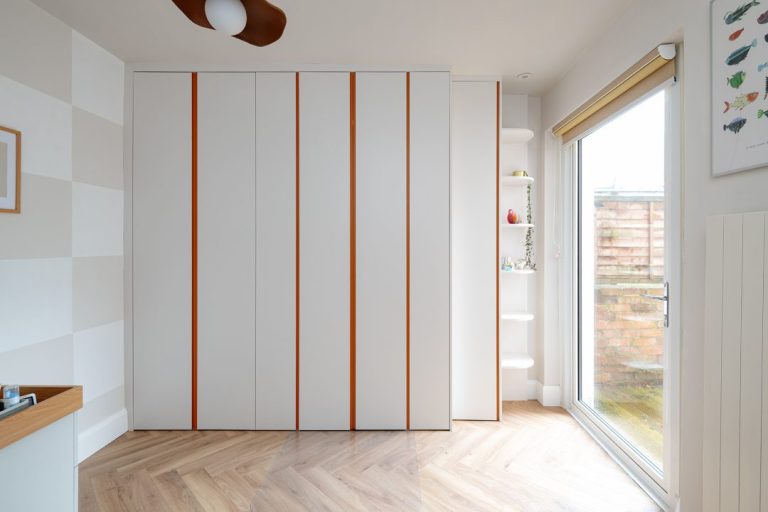 White modern wardrobe with corner shelving