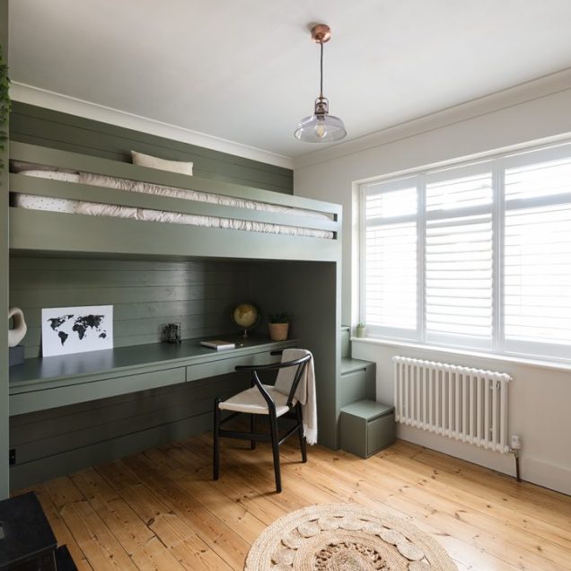 Green fitted children's cabin bed with desk